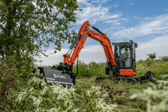 Excavator with mower attachment