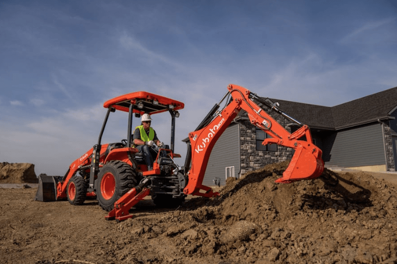 TLB excavating on a site