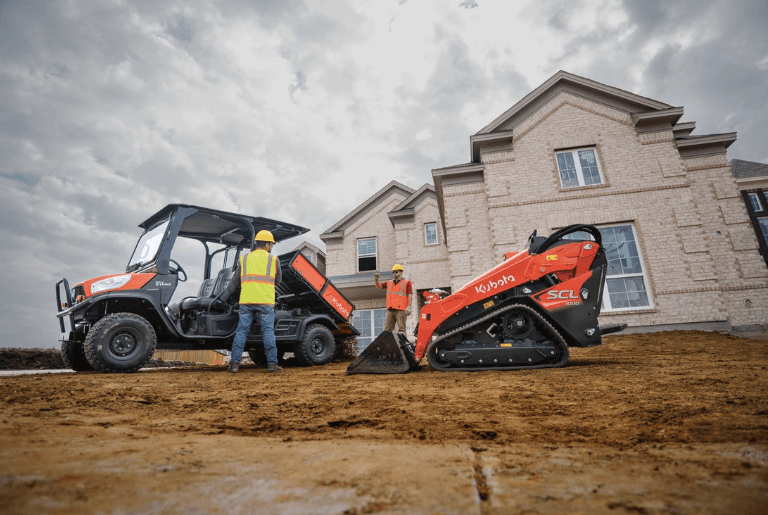 Professional on construction site using equipment
